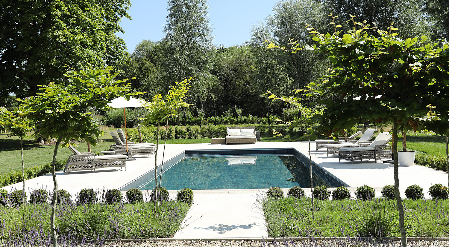 The outdoor swimming pool of the stunning, stylishly decorated vicarage in Church Road, Bucks