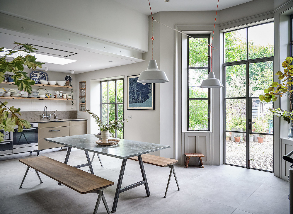 Stylish kitchen/dining space with large windows and lots of light at Victorian house in East Dulwich