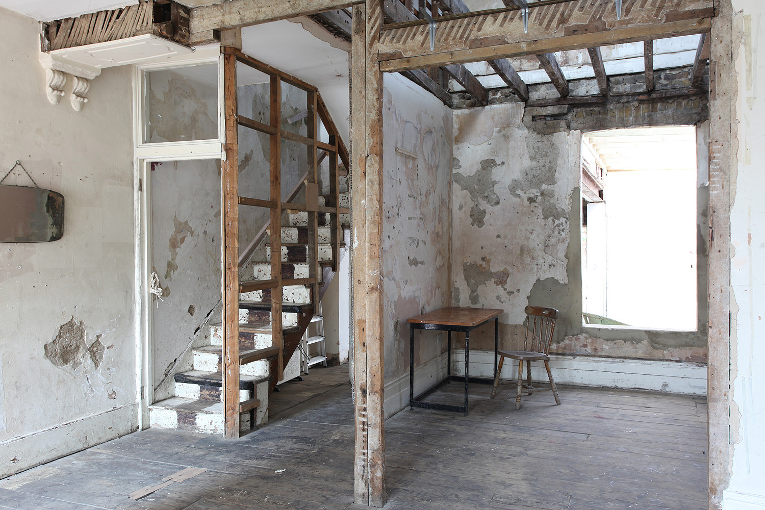 Open plan space at stripped back Victorian house in Peckham