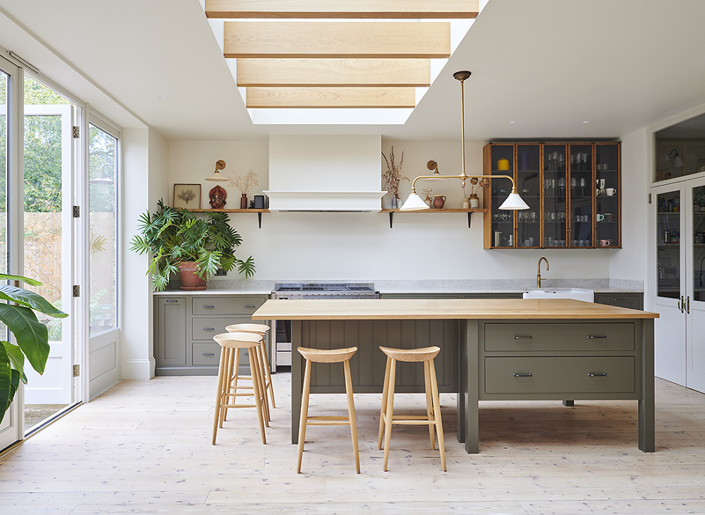 Modern kitchen with kitchen island in Victorian house in South East London.